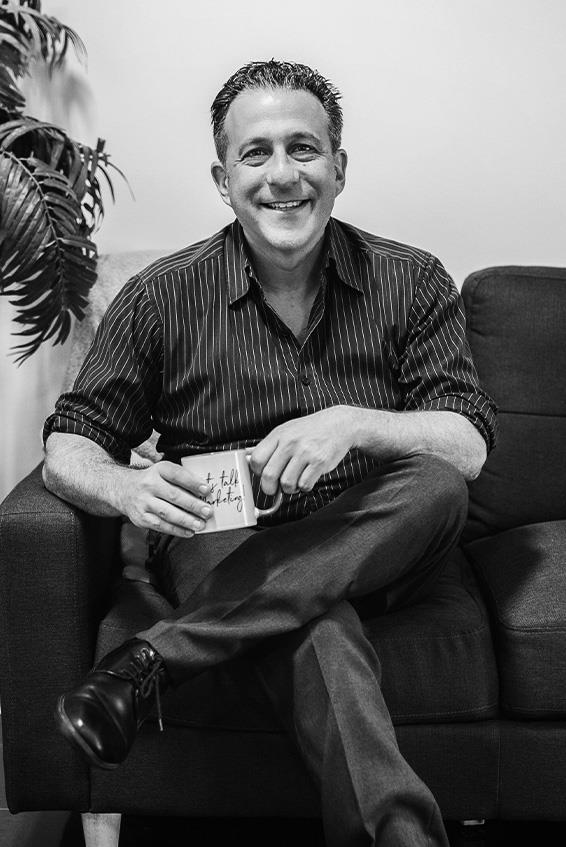 jamie schachter sales director in black and white